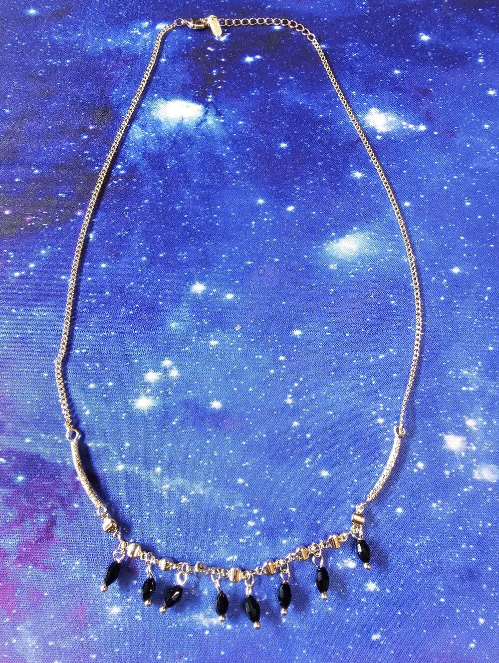 Gold-toned Necklace with Black Teardrop Beads